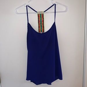 Navy tank with neon design on back